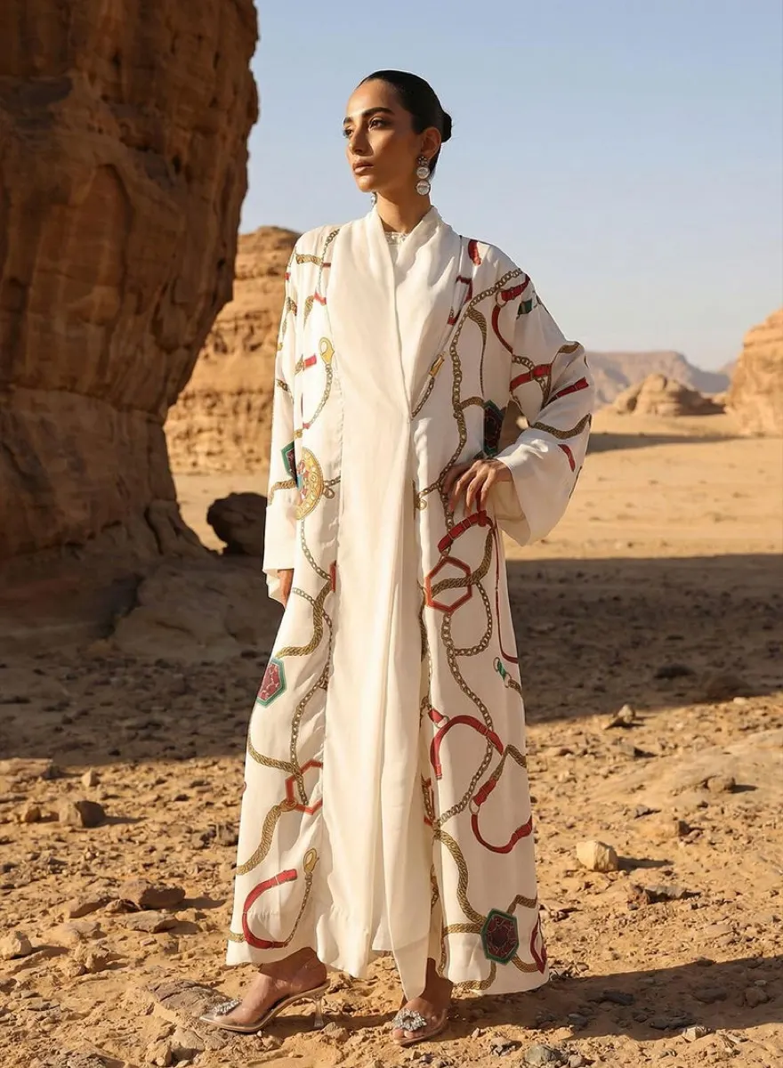 Model wearing a printed layered abaya